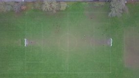 Aerial Drone Shot Rising Above Football Soccer Fields, Revealing slowly whole Pitches. 4K video