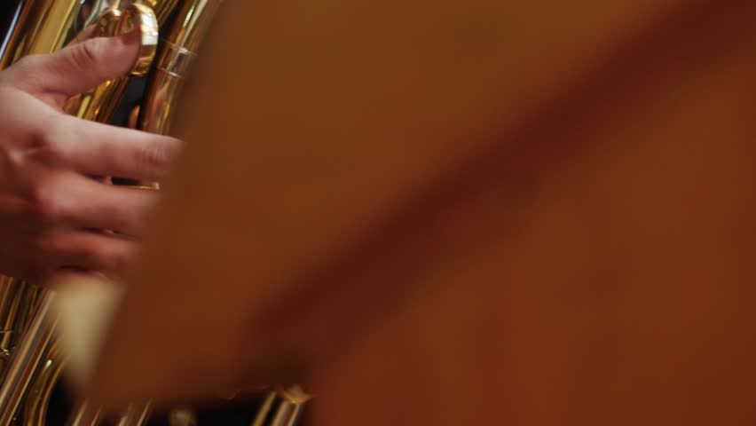 Orchestra Musician Playing Brass Close Up  Royalty-Free Stock Footage #1019988679