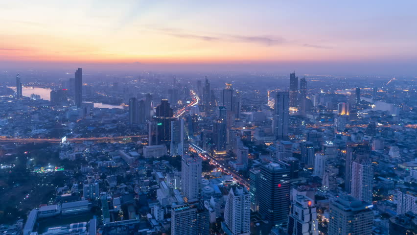 Time lapse high view high rise buildings in bangkok thailand road in wide angle at twilight. | Shutterstock HD Video #1019994253