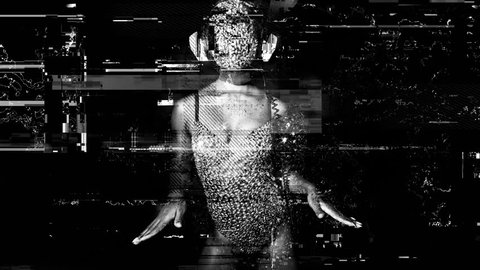 amazing woman dancing in diamond covered face mask and costume with intentional overlayed video distortion and glitch effects