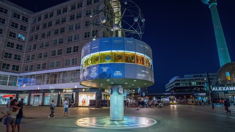 Berlin, Germany- Circa 2018: Hyper lapsed view of the famous World Clock located in the public square of Alexanderplatz in Mitte. The current time in 148 major cities is shown.