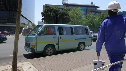 Johannesburg, South Africa, 17 November - 2018: People getting out of minibus taxi.
