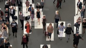 High view of commuters walking. Facial recognition interface showing personal data for each person. Surveillance concept. Artificial intelligence. Deep learning. - Powered by Shutterstock - Get 15% off with code: PIKWIZARD15
