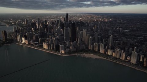 Chicago, Illinois - Circa-2015: Wide angle morning aerial view of the Chicago skyline moving towards Navy Pier