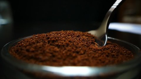Spoon take freshly ground coffee. Brew smelling morning coffee. Cooking hot bracing drink. Arabica cup.