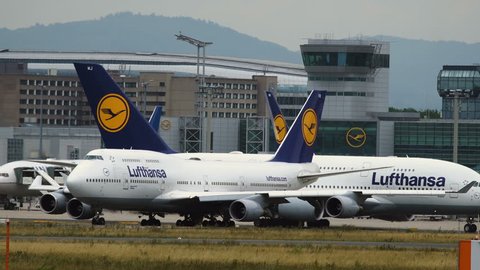 FRANKFURT AM MAIN, GERMANY - JULY 19, 2017: Two biggest airplanes of civil aviation, Boeing 747 and Airbus A380 of Lufthansa airlines