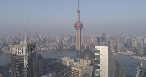 Shanghai China Circa-2017, daytime aerial reverse zoom shot view of the cityscape. 