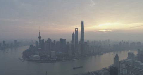 Shanghai China Circa-2017, daytime side tracking aerial view of the cityscape