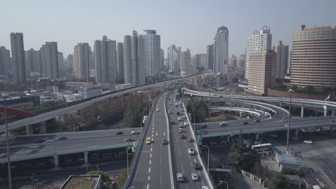 Shanghai, China - Circa 2017, aerial view of highway through city