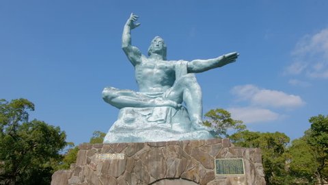 Nagasaki,Kyushu,Japan - October 24, 2018 :Nagasaki Peace statue at Nagasaki Peace Park, commemorating an atomic bomb during World War 2 on August 9, 1945. A symbol of hope and peace