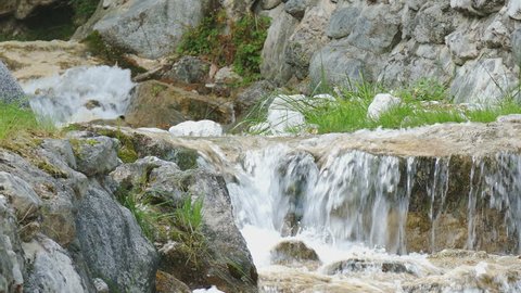 beautiful mountain stream with small waterfalls
