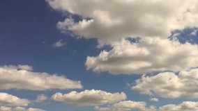 White clouds, clear soft sky, time lapse formating cloudscape in horizon, rainy rolling & fast moving, beautiful summer sunny day, colourful weather.
