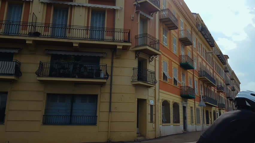 Traditional building on Nice street, vacation France, european culture, travel