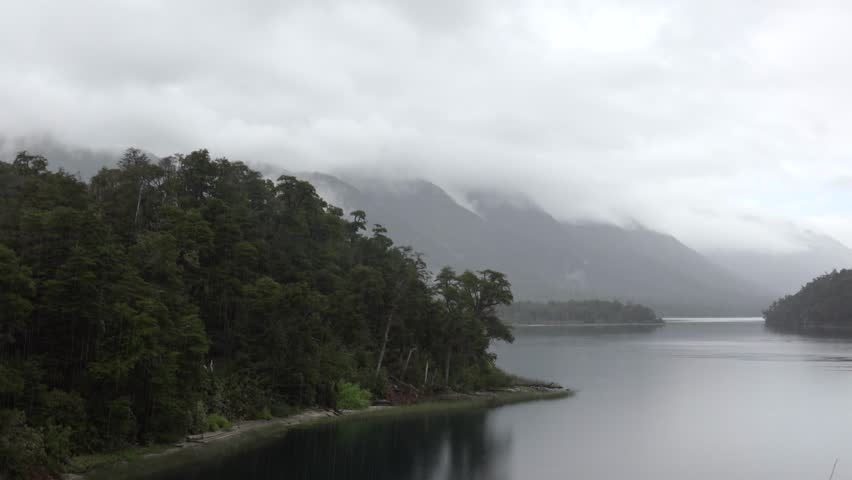 Rain over Correntoso lake at the Route Of The Seven Lakes (Route 40).  Patagonia, Neuquen, Argentina