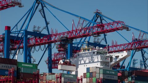 Hamburg / Germany / 05/12/2018 Video loop, Cargo ship is loaded, seamless looping 