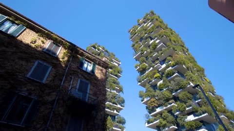 Milan, Italy - September 26, 2018: Modern and ecologic skyscrapers with many trees on every balcony