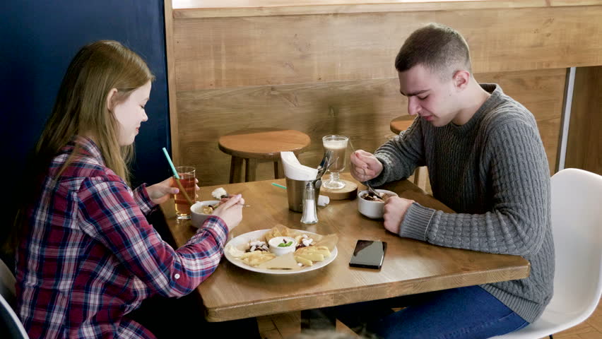 Alice and ron in a cafe now