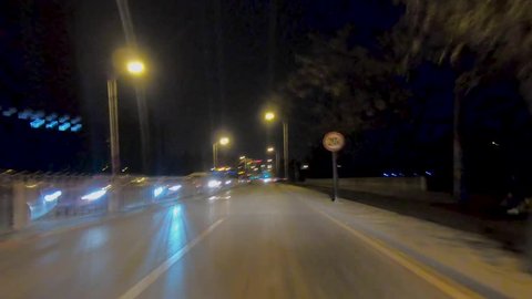 Night time-lapse. POV - Point of view. Car driving on a road during extreme gray pollution day. Beijing. China. 2018/11/14