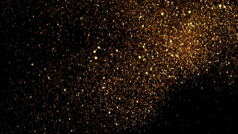 Golden glitter background in super slow motion shooted with high speed cinema camera at 1000fps 4K