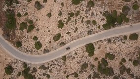 Aerial Footage Top View of Road with cars in Cape Greco National Park located in Cyprus, Sunny Summer Day