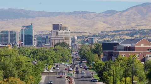 Classic panoramic view of Boise skyline with famous Idaho State Capitol and mountain range in the background on a beautiful sunny day with blue sky, Idaho, USA