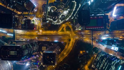 night illuminated city center traffic streets aerial timelapse topdown panorama 4k hong kong