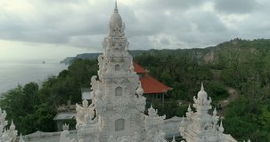 Aerial view of white traditional Hindu temple, Indonesia, Bali, Nusa Penida island, 4K.