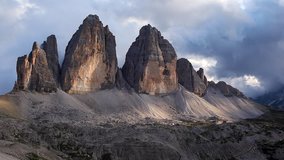 View of the National park Tre Cime di Lavaredo. Location most popular tourist place Dolomiti alps, Tyrol, Italy, Europe. Scenic footage of weather. Discover the beauty of earth. Full HD 1080p video.