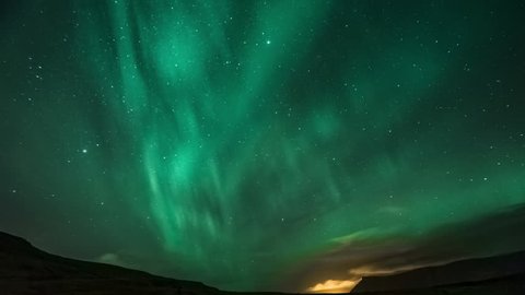 4K Time lapse Aurora Borealis (Northern Lights) in full moon night, Iceland.