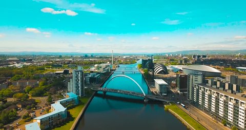 Drone shot of the River Clyde in Glasgow, faeturing the Clyde Arc - known as the 'Squinty Bridge'.
