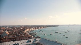 Italy, Venice. City overview from the high point. Sea, boats