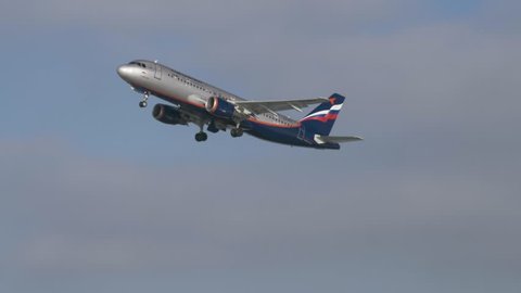 MOSCOW, RUSSIA - FEBRUARY 01, 2018: Passenger airplane Airbus A320-200 of Aeroflot airline flying in blue sky. The flag carrier and largest airline in the country