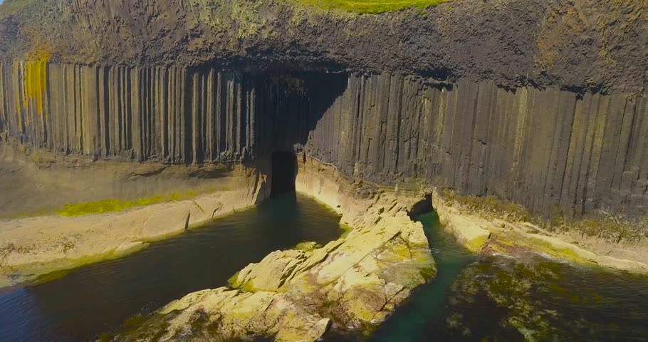 Drone shot of the island of Staffa, off the west coast of Scotland - where Fingal's Cave is located (& in shot).