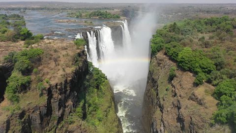 Drone flight at the full length of the world famous Victoria Falls, right at the border between Zambia and Zimbabwe in Southern Africa. The flight starts in Zimbabwe and ends in Zambia. 