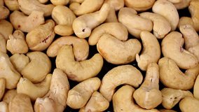 Cashew seed nut looping texture pattern closeup video