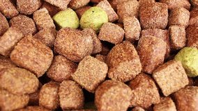 Dog food dry grains pet foods looping texture pattern closeup video