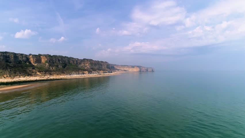 Drone footage - Aerial shot of bridge and cliffs at Omaha Beach (D-day World War 2) in Normandy France