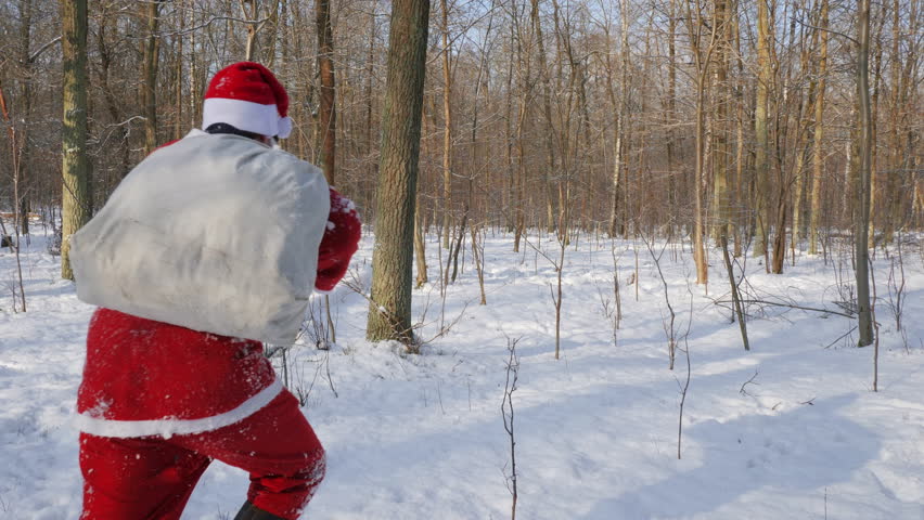 man santa claus costume runs away Stock Footage Video (100% Royalty ...