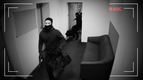 Undefined thieves escaping from place of crime, armed robbery, CCTV effect