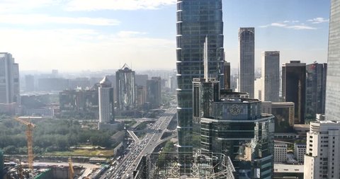 4k,Aerial View of heavy traffic through BeiJing central business district that is located in the Chaoyang district,It's the main hub for financial and business activities in China's capital city. 