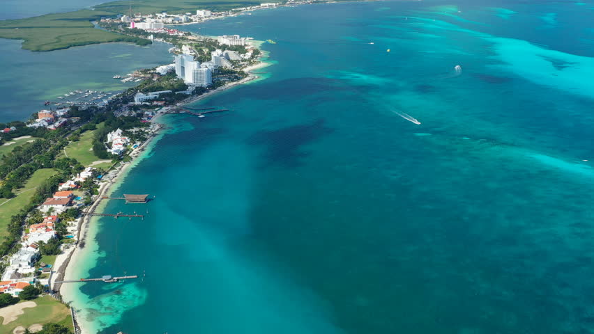 Aerial view of cityscape of Cancun, famous resort city by Caribbean Sea - landscape panorama of Yucatan Peninsula from above, Mexico, Central America, 4k UHD