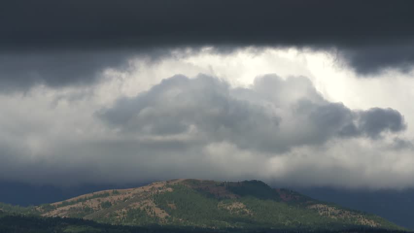 Rollinng stormy clouds over mountain in Idaho.
