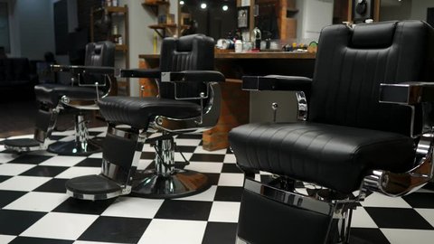 Authentic haircut for men. Barbershop in retro style. Steadicam shot