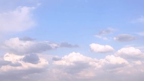 Very beautiful white clouds time lapse, nature blue skies in background, beautiful fluffy, puffy cloudscape in horizon, cloudy weather after rain.