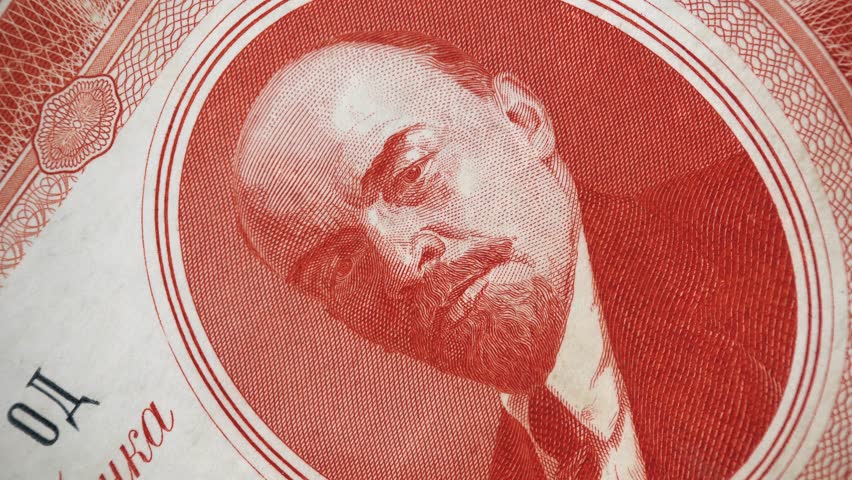 Vladimir Lenin portrait on Russia rouble (1937) banknote rotating. Russian communist revolutionary, politician and marxism theorist, leader of Russian revolution 1917. 4K UHD video footage