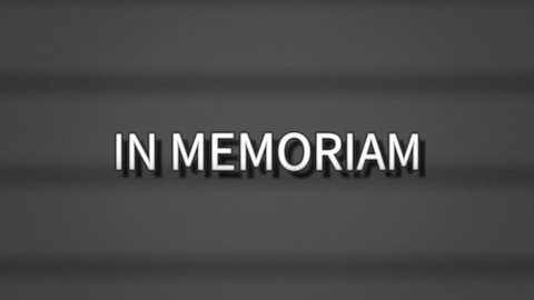 A sharp serious text, white letters on a grey background, appearing on a retro vintage TV screen with scanlines: In Memoriam (latin words, meaning In memory of a dead person).