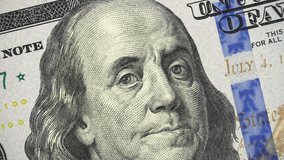 Benjamin Franklin on US 100 dollar bill 2013 rotating, money close up. 4K ultra hd video clip
