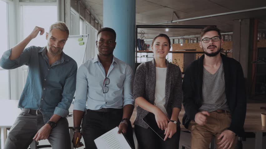 Multinational team of business people are looking at the camera showing thumbs up. Success. International business. Friendly working environment. Team building Royalty-Free Stock Footage #1020358360