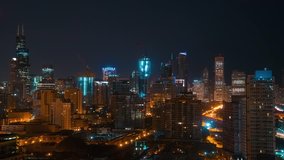 Sunrise time-lapse of the Downtown Chicago cityscape - night transitions to day