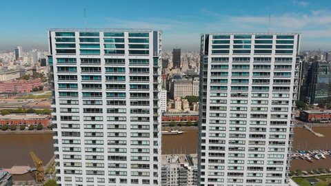 Buenos Aires, Argentina - November 21, 2018: Close up aerial drone view of luxury residential condominium skyscraper buildings in Puerto Madero. 